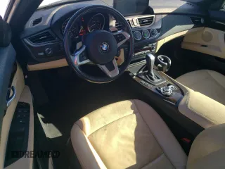 2011 BMW Z4 sDrive30i with VIN WBALM5C5XBE379064, listed as a Copart auction lot 87475414 with 105,420 mi miles and Salvage Title. Bid and sale history available at carsss.com. Image 8.