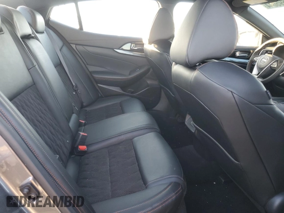 2023 Nissan Maxima SR with VIN 1N4AA6EV6PC513972, listed as a Copart auction lot 86695044 with 27,174 mi miles and Salvage title. Bid and sale history available at DreamBid. Image 10.