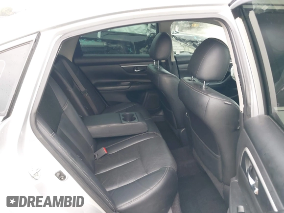 2018 Nissan Altima SR with VIN 1N4AL3AP6JC151861, listed as a IAAI auction lot 40010666 with 140,228 mi miles and . Bid and sale history available at DreamBid. Image 8.