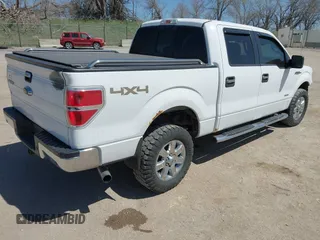 2014 Ford F-150 XL with VIN 1FTFW1ET6EKF37386, listed as a IAAI auction lot 42026773 with 137,759 mi miles and . Bid and sale history available at DreamBid. Image 4.