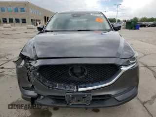 2018 Mazda CX-5 Touring z VIN JM3KFBCM4J0349687, wystawiony jako Copart lot #55857945 z przebiegiem Nie podano mil oraz Szkoda całkowita • Salvage title. Historia ofert i sprzedaży dostępna na DreamBid. Obrazek 5.