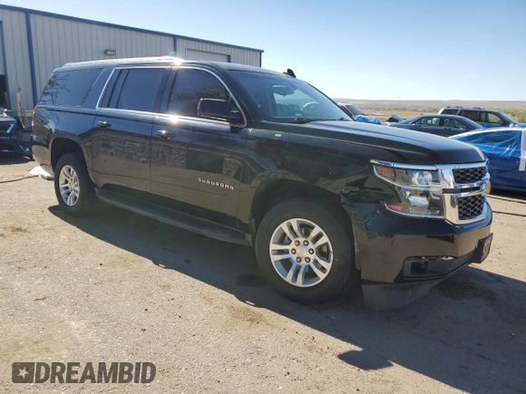 2019 Chevrolet Suburban LS with VIN 1GNSCGKC6KR180042, listed as a Copart auction lot 76829394 with 75,574 mi miles and Salvage title. Bid and sale history available at DreamBid. Image 4.