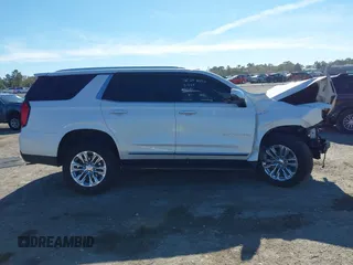 2022 GMC Yukon SLT with VIN 1GKS1BKT7NR329018, listed as a IAAI auction lot 41181065 with 50,551 mi miles. Bid and sale history available at carsss.com. Image 13.