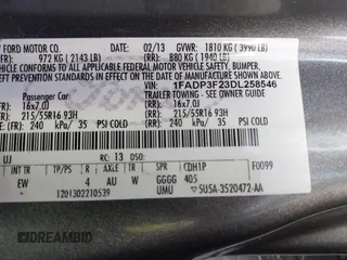 2013 Ford Focus SE with VIN 1FADP3F23DL258546, listed as a IAAI auction lot 41884513 with 156,775 mi miles. Bid and sale history available at carsss.com. Image 9.