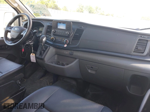 2023 Ford Transit Cargo with VIN 1FTBR1X81PKB46146, listed as a IAAI auction lot 42180262 with 75,169 mi miles and . Bid and sale history available at DreamBid. Image 12.
