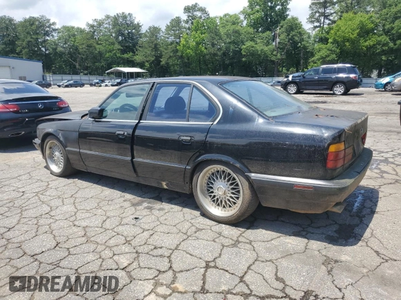 1989 BMW 5 Series with VIN WBAHD1314KBF08237, listed as a Copart auction lot 58951325 with 255,984 mi miles and Clean title. Bid and sale history available at DreamBid. Image 2.