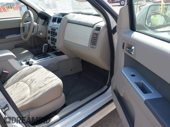 2010 Mercury Mariner Premier with VIN 4M2CN8HG5AKJ07771, listed as a IAAI auction lot 41779514 with 187,786 mi miles and . Bid and sale history available at DreamBid. Image 5.