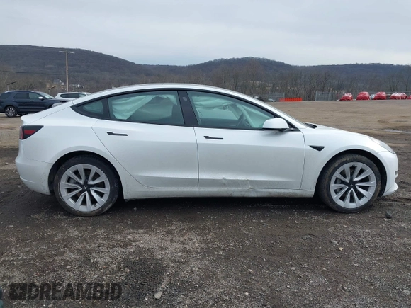 2023 Tesla Model 3 Long Range with VIN 5YJ3E1EB8PF600291, listed as a IAAI auction lot 41651156 with 37,055 mi miles and . Bid and sale history available at DreamBid. Image 12.