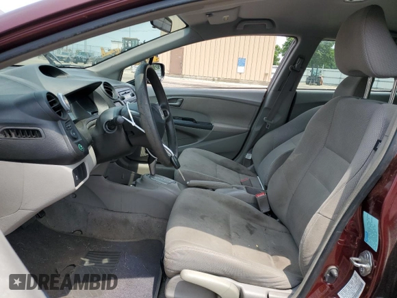 2011 Honda Insight with VIN JHMZE2H31BS008097, listed as a Copart auction lot 60780625 with 111,688 mi miles and Salvage title. Bid and sale history available at DreamBid. Image 7.