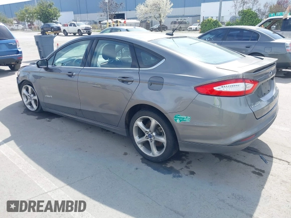 2014 Ford Fusion SE Hybrid with VIN 3FA6P0LU4ER195506, listed as a IAAI auction lot 41859599 with 159,374 mi miles. Bid and sale history available at carsss.com. Image 3.