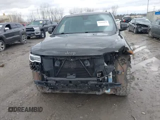 2016 Jeep Grand Cherokee Limited z VIN 1C4RJFBG5GC406494, wystawiony jako IAAI lot #41662039 z przebiegiem 139 944 mil mil oraz . Historia ofert i sprzedaży dostępna na DreamBid. Obrazek 12.