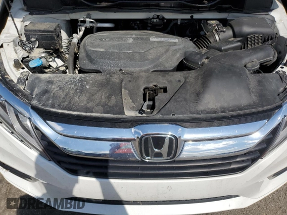 2020 Honda Odyssey EX-L z VIN 5FNRL6H79LB040523, wystawiony jako Copart lot #57383005 z przebiegiem 105 754 mil mil oraz Szkoda całkowita • Salvage title. Historia ofert i sprzedaży dostępna na DreamBid. Obrazek 12.