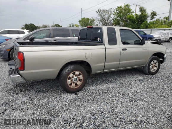 2000 Nissan Frontier XE with VIN 1N6DD26S6YC415423, listed as a Copart auction lot 59086535 with 122,746 mi miles and Salvage title. Bid and sale history available at DreamBid. Image 3.