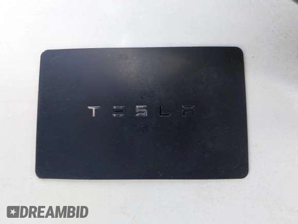 2018 Tesla Model 3 Long Range Battery z VIN 5YJ3E1EA4JF078080, wystawiony jako IAAI lot #41688015 z przebiegiem 97 886 mil mil oraz . Historia ofert i sprzedaży dostępna na DreamBid. Obrazek 11.