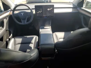 2024 Tesla Model Y Long Range с VIN 7SAYGDEE6RF157415, выставлен на аукционе Copart как лот 54950915 с пробегом 20 567 миль миль и Списание • Salvage title. История ставок и продаж доступна на DreamBid. Изображение 8.