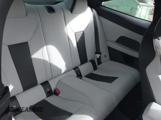 2022 BMW M4 Competition xDrive with VIN WBS43AZ06NCH93498, listed as a IAAI auction lot 41563322 with 10,449 mi miles. Bid and sale history available at carsss.com. Image 8.