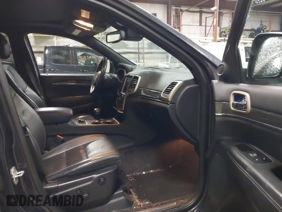 2014 Jeep Grand Cherokee Overland with VIN 1C4RJFCT9EC234270, listed as a IAAI auction lot 41938621 with 144,541 mi miles and . Bid and sale history available at DreamBid. Image 5.