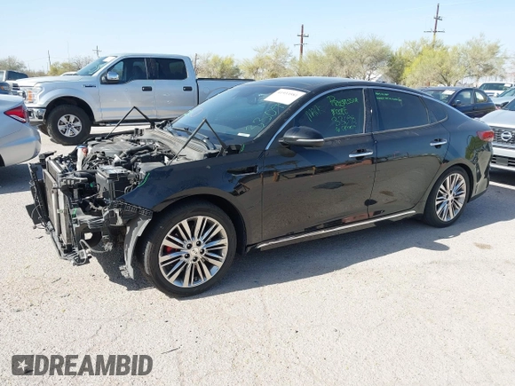2016 Kia Optima SXL Turbo with VIN 5XXGV4L29GG086468, listed as a IAAI auction lot 41933581 with 186,881 mi miles. Bid and sale history available at carsss.com. Image 2.