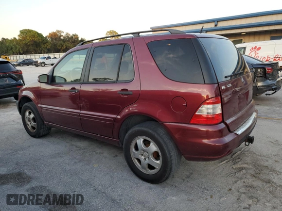 2002 Mercedes-Benz M-Class with VIN 4JGAB54E72A300774, listed as a Copart auction lot 75990134 with 312,541 mi miles and Salvage Title. Bid and sale history available at carsss.com. Image 2.