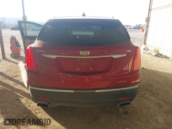 2019 Cadillac XT5 Premium Luxury FWD z VIN 1GYKNERS0KZ157287, wystawiony jako IAAI lot #41106524 z przebiegiem 131 464 mil mil oraz . Historia ofert i sprzedaży dostępna na DreamBid. Obrazek 16.