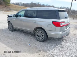 2020 Lincoln Navigator with VIN 5LMJJ2NTXLEL09782, listed as a IAAI auction lot 41639938 with 59,125 mi miles and . Bid and sale history available at DreamBid. Image 3.
