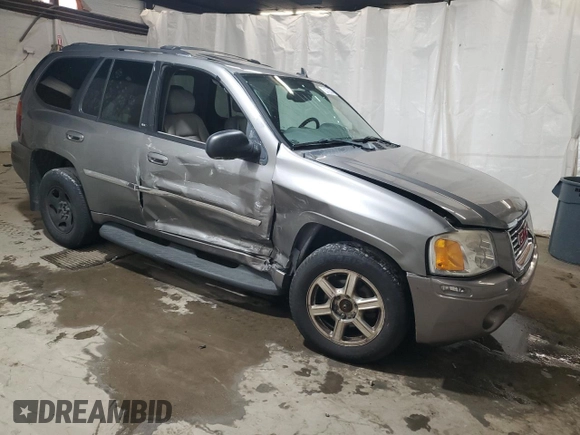 2007 GMC Envoy SLT with VIN 1GKDT13S072260591, listed as a Copart auction lot 70370504 with 200,441 mi miles and Salvage Title. Bid and sale history available at carsss.com. Image 4.
