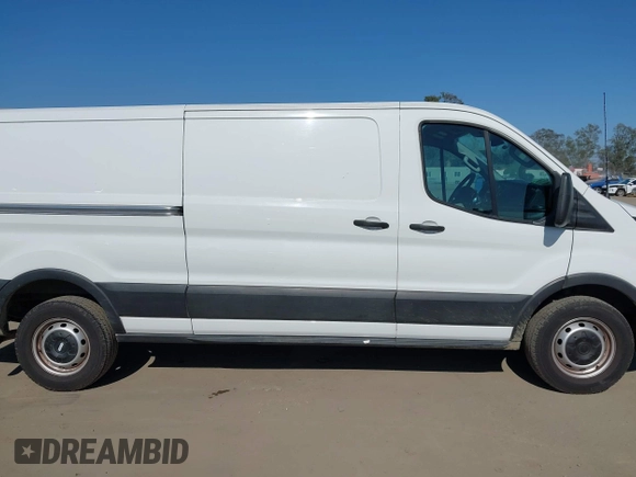 2020 Ford Transit Cargo with VIN 1FTBR1Y83LKA67103, listed as a IAAI auction lot 42408599 with 76,837 mi miles and . Bid and sale history available at DreamBid. Image 13.