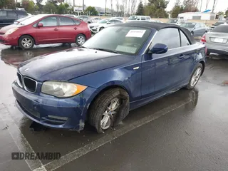 2010 BMW 1 Series 128i with VIN WBAUL7C58AVJ77695, listed as a IAAI auction lot 41938031 with Not Provided miles and . Bid and sale history available at carsss.com. Image 2.