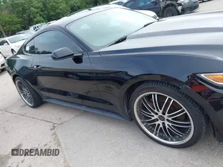 2016 Ford Mustang V6 z VIN 1FA6P8AM3G5256187, wystawiony jako IAAI lot #42415645 z przebiegiem 141 235 mil mil oraz . Historia ofert i sprzedaży dostępna na DreamBid. Obrazek 13.