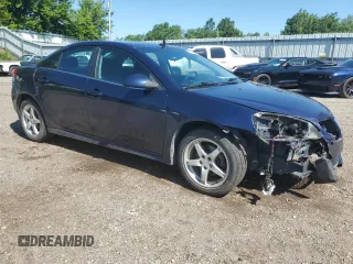 2009 Pontiac G6 1SB with VIN 1G2ZJ57K694272894, listed as a Copart auction lot 63006935 with 125,640 mi miles and Clean title. Bid and sale history available at DreamBid. Image 4.