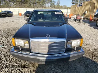 1989 Mercedes-Benz 560 with VIN WDBCA39E9KA463003, listed as a Copart auction lot 49808495 with 125,388 mi miles and Salvage Title. Bid and sale history available at DreamBid. Image 5.