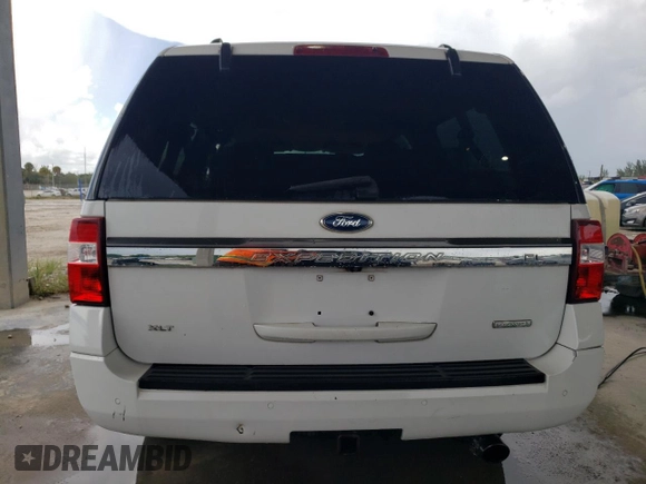 2015 Ford Expedition EL XLT with VIN 1FMJK1HTXFEF13525, listed as a Copart auction lot 68974014 with 69,489 mi miles and Salvage Title. Bid and sale history available at carsss.com. Image 6.
