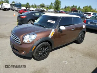 2014 MINI Paceman z VIN WMWSS1C58EWN94368, wystawiony jako Copart lot #54159275 z przebiegiem 57 383 mil mil oraz Szkoda całkowita • Salvage title. Historia ofert i sprzedaży dostępna na DreamBid. Obrazek 1.
