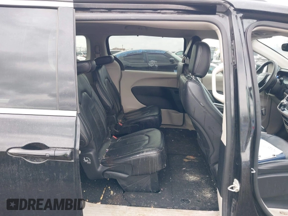 2022 Chrysler Pacifica Touring L with VIN 2C4RC1BG2NR117879, listed as a IAAI auction lot 41845778 with 96,523 mi miles and . Bid and sale history available at DreamBid. Image 8.