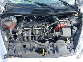 2019 Ford Fiesta ST-Line z VIN 3FADP4DJ1KM112318, wystawiony jako IAAI lot #42322602 z przebiegiem 57 205 mil mil oraz . Historia ofert i sprzedaży dostępna na DreamBid. Obrazek 10.