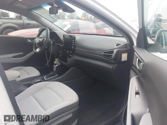 2022 Hyundai Ioniq Blue with VIN KMHC65LC7NU280672, listed as a IAAI auction lot 42432826 with 11,486 mi miles and . Bid and sale history available at DreamBid. Image 5.