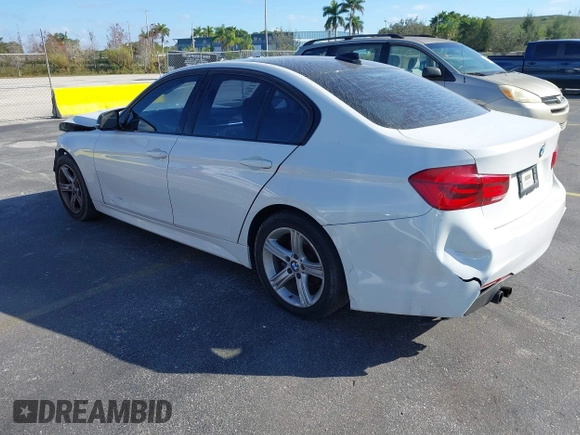 2014 BMW 3 Series 328i with VIN WBA3A5C55EP647035, listed as a IAAI auction lot 41480711 with 105,792 mi miles. Bid and sale history available at carsss.com. Image 3.