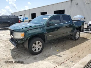 2015 GMC Canyon 2WD SLE with VIN 1GTG5BE34F1228259, listed as a Copart auction lot 61258475 with 130,819 mi miles and Salvage title. Bid and sale history available at DreamBid. Image 1.