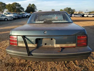 1993 Oldsmobile Cutlass Ciera S z VIN 1G3AG55N2P6435739, wystawiony jako Copart lot #79994014 z przebiegiem 111 189 mil mil oraz Szkody całkowita. Historia ofert i sprzedaży dostępna na DreamBid. Obrazek 6.