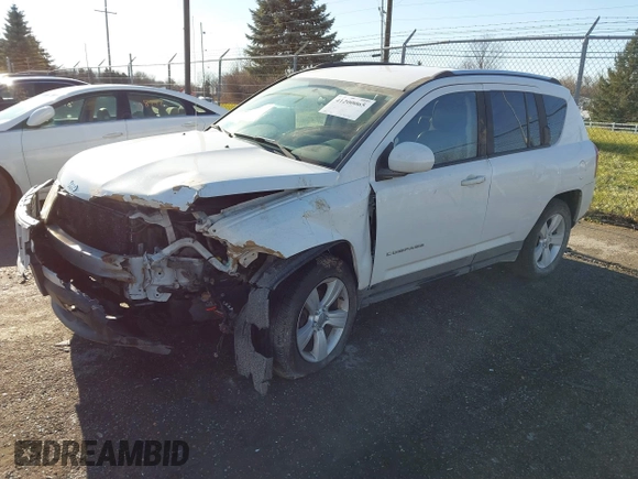 2014 Jeep Compass Latitude with VIN 1C4NJCEB0ED660019, listed as a IAAI auction lot 41200065 with 185,174 mi miles. Bid and sale history available at carsss.com. Image 17.