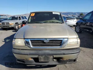 1999 Mazda B-Series Truck SX z VIN 4F4YR12C1XTM39102, wystawiony jako Copart lot #83462634 z przebiegiem 241 380 mil mil oraz Szkoda całkowita • Salvage title. Historia ofert i sprzedaży dostępna na DreamBid. Obrazek 5.