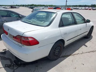2000 Honda Accord LX z VIN 1HGCG1640YA067195, wystawiony jako IAAI lot #42316640 z przebiegiem 214 225 mil mil oraz . Historia ofert i sprzedaży dostępna na DreamBid. Obrazek 4.