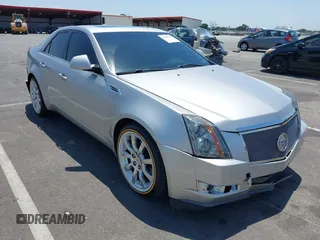 2008 Cadillac CTS RWD z VIN 1G6DV57V880153063, wystawiony jako IAAI lot #42440277 z przebiegiem 158 312 mil mil oraz . Historia ofert i sprzedaży dostępna na DreamBid. Obrazek 1.