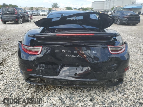 2015 Porsche 911 Turbo S z VIN WP0AD2A94FS166536, wystawiony jako Copart lot #71944844 z przebiegiem 9 222 mil mil oraz Szkoda całkowita • Salvage title. Historia ofert i sprzedaży dostępna na DreamBid. Obrazek 6.