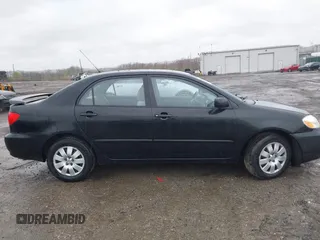 2004 Toyota Corolla CE with VIN 2T1BR32E14C260041, listed as a IAAI auction lot 42026930 with 180,814 mi miles. Bid and sale history available at carsss.com. Image 12.