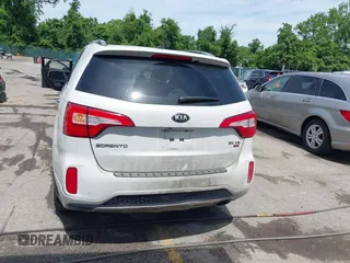 2014 Kia Sorento SX z VIN 5XYKWDA70EG541044, wystawiony jako IAAI lot #42301841 z przebiegiem 196 550 mil mil oraz . Historia ofert i sprzedaży dostępna na DreamBid. Obrazek 16.