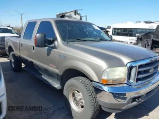 2004 Ford Super Duty F-250 XL with VIN 1FTNW21P44EC72300, listed as a IAAI auction lot 41841910 with 211,503 mi miles. Bid and sale history available at carsss.com. Image 1.