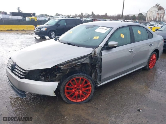 2014 Volkswagen Passat Wolfsburg Ed with VIN 1VWAT7A39EC067390, listed as a IAAI auction lot 41555240 with 151,147 mi miles. Bid and sale history available at carsss.com. Image 2.