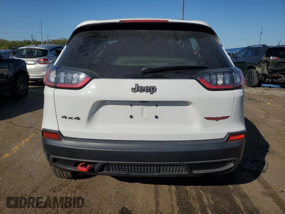 2022 Jeep Cherokee Trailhawk with VIN 1C4PJMBX1ND524383, listed as a Copart auction lot 56370805 with 25,145 mi miles and Salvage title. Bid and sale history available at DreamBid. Image 6.