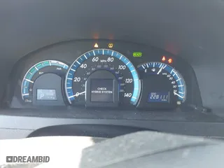 2014 Toyota Camry Hybrid LE with VIN 4T1BD1FKXEU138765, listed as a IAAI auction lot 41761389 with 228,111 mi miles. Bid and sale history available at carsss.com. Image 7.